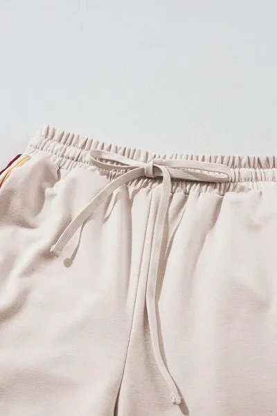Logan Striped Round Neck Sweatshirt and Drawstring Joggers Set