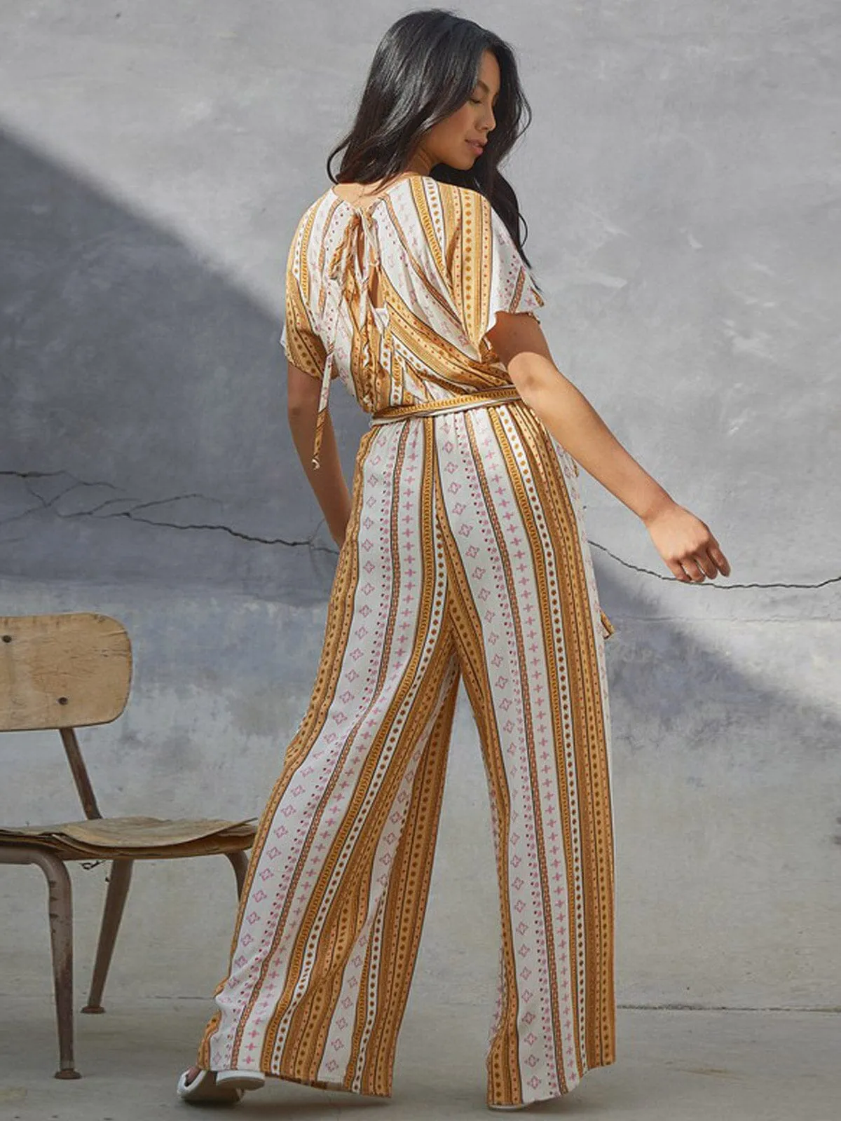 WOMEN'S SHORT SLEEVE FRONT POCKETS MULTI PRINT WIDE LEG JUMPSUIT